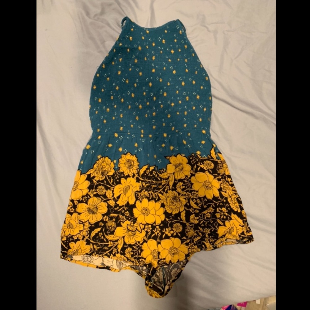 Adorable Tie Back Smocked Romper!